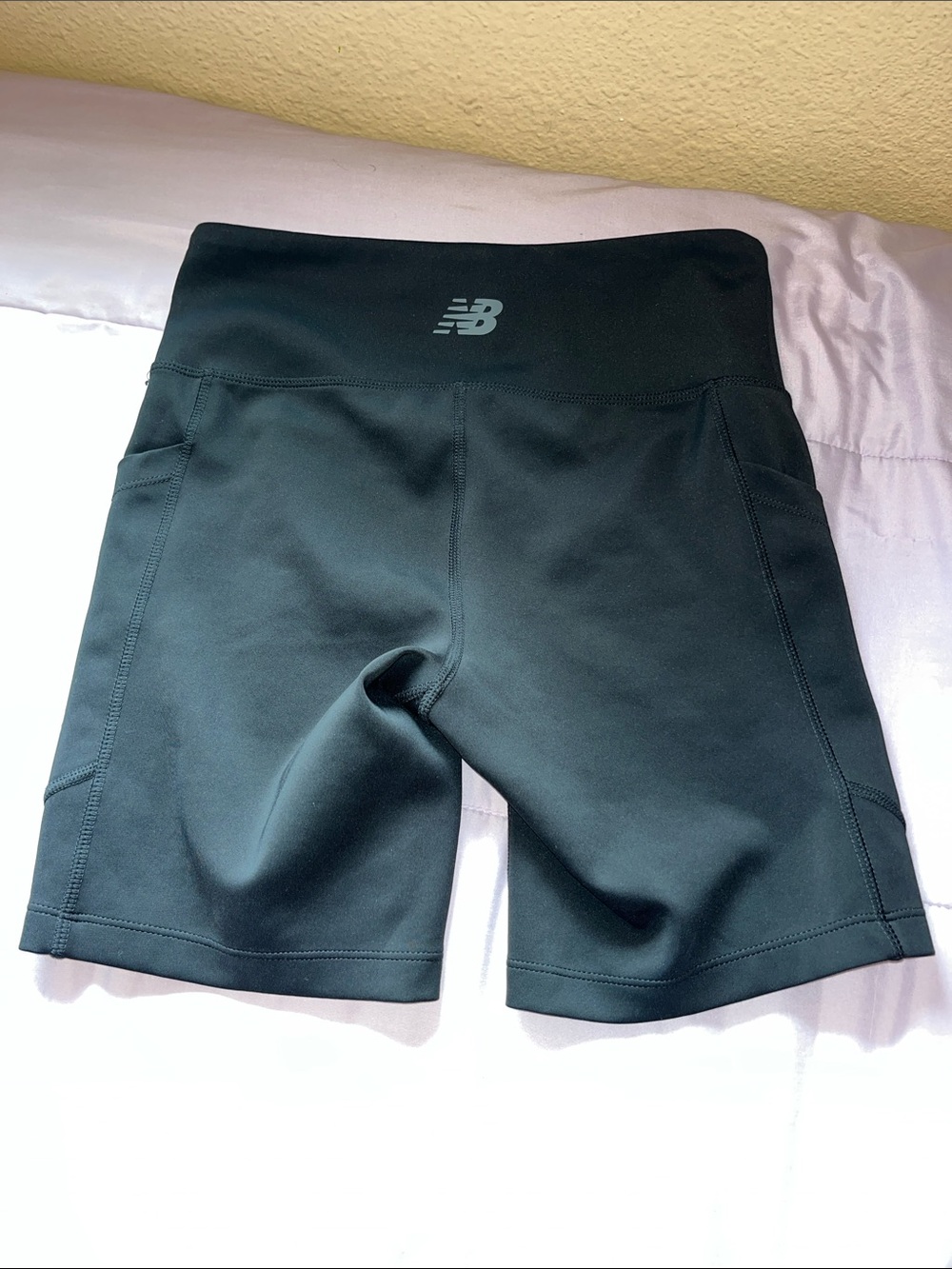 New Balance Women's Black High-Rise Bike Shorts with Side Pockets
